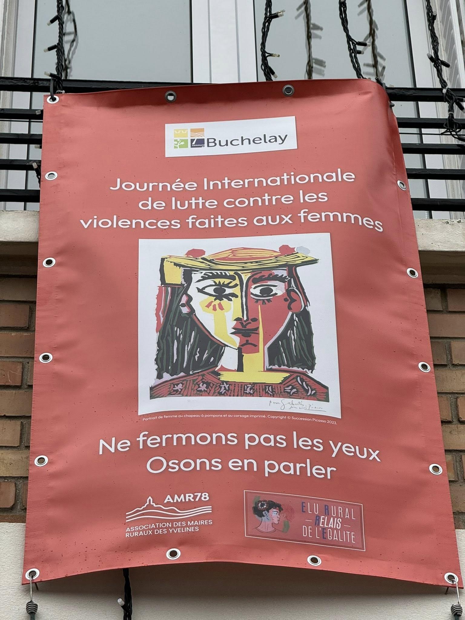 Banderole Buchelay Journée internationale de lutte contre les violences faites aux femmes